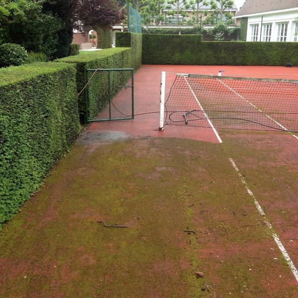Hogedrukreiniging van opritten, terrassen en parkings