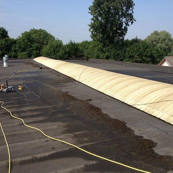 Hogedrukreiniging van opritten, terrassen en parkings